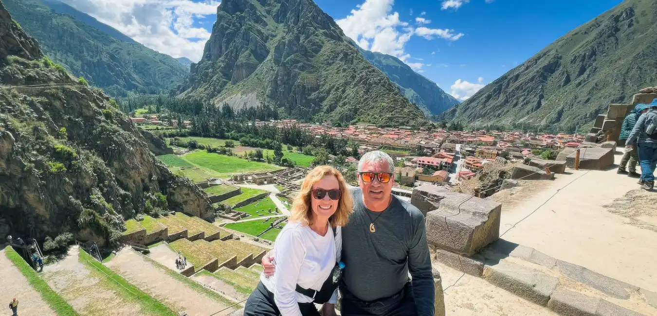 Couple overlooking Ollantaytambo fortress on a Sacred Valley day trip