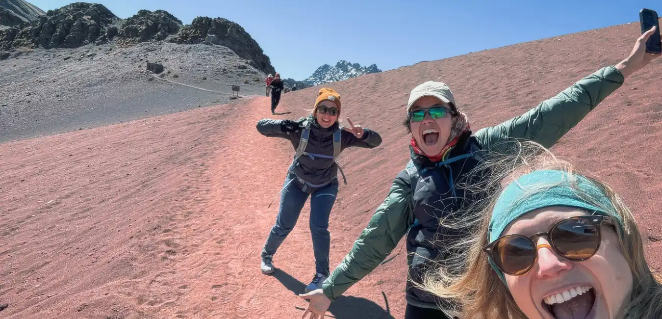 Summit sign on Rainbow Mountain full day tour from Cusco