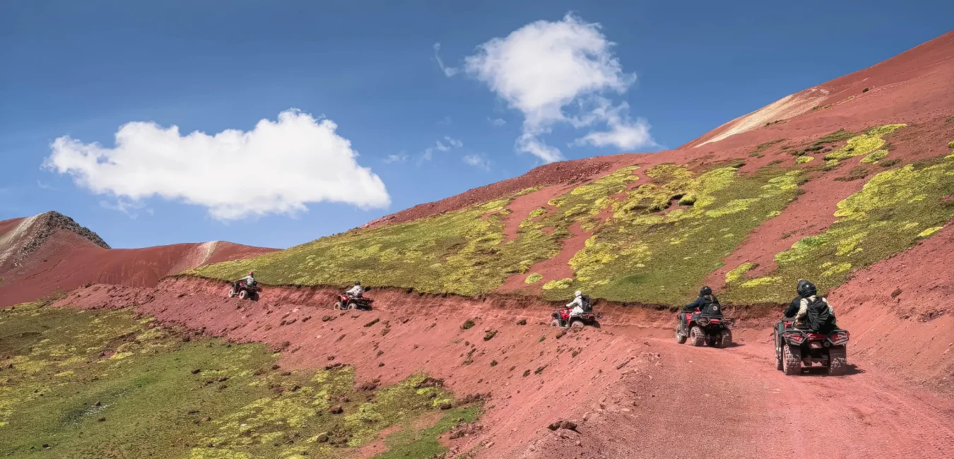 ATV ride through the colorful landscapes on the way to Rainbow Mountain
