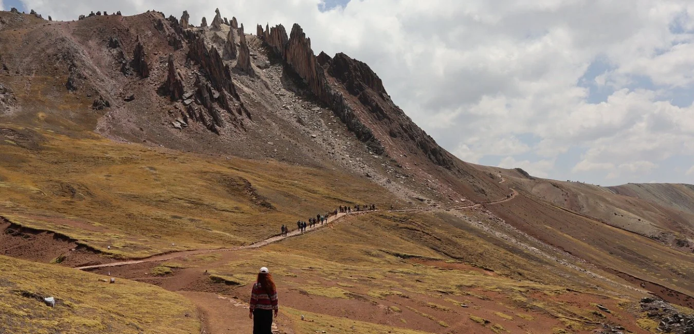 Hiking trail through the Palcoyo Rainbow Mountain landscapes