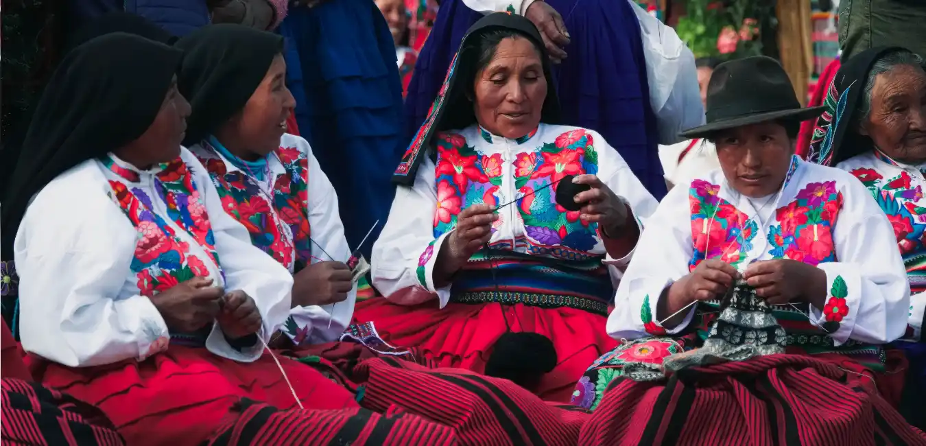 Local artisans weaving traditional handmade textiles on Taquile Island 