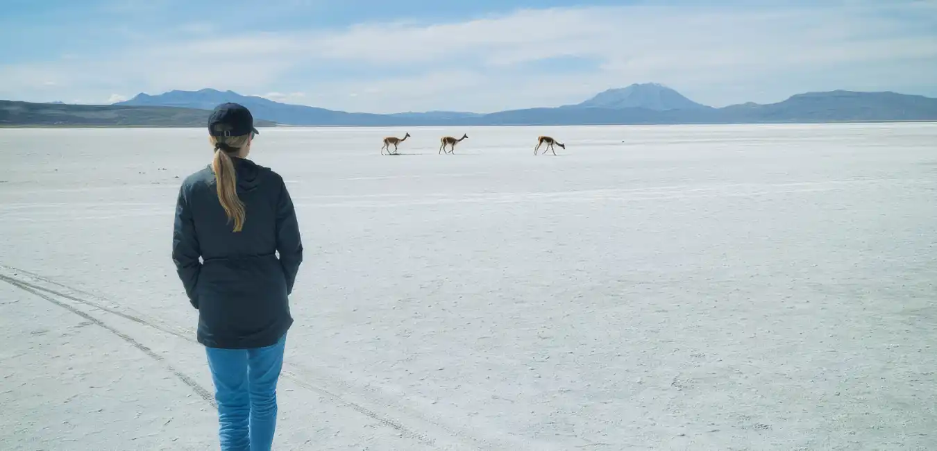 Tourist exploring Salinas de Aguada Blanca 