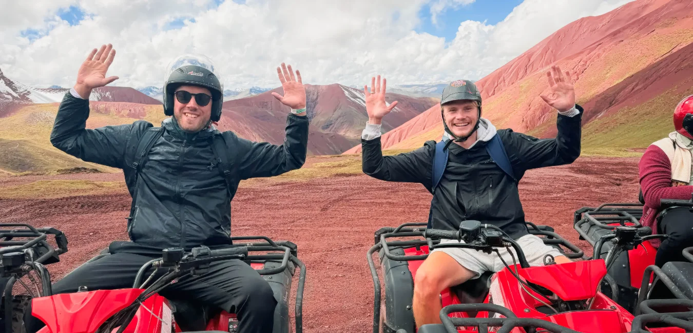 Travelers at the Rainbow Mountain viewpoint after the ATV adventure
