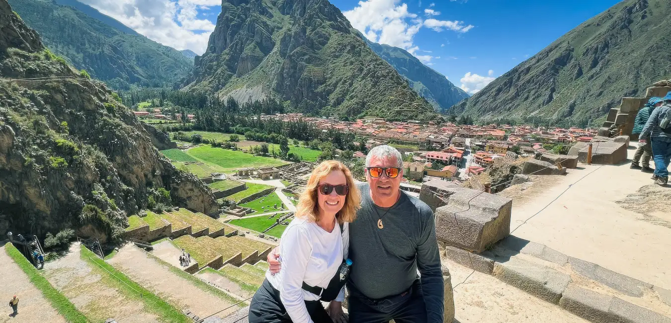 Traveler enjoying the panoramic view of the Ollantaytambo 