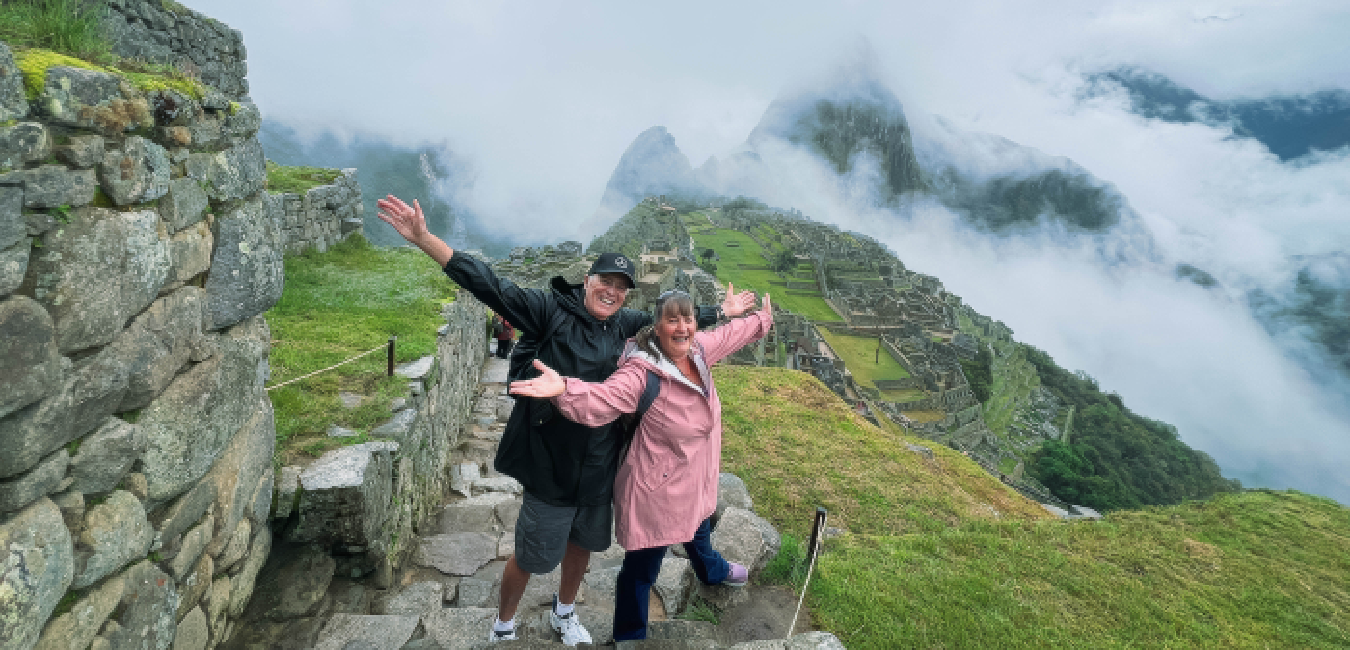 Couple visiting Machu Picchu during a Peru tour