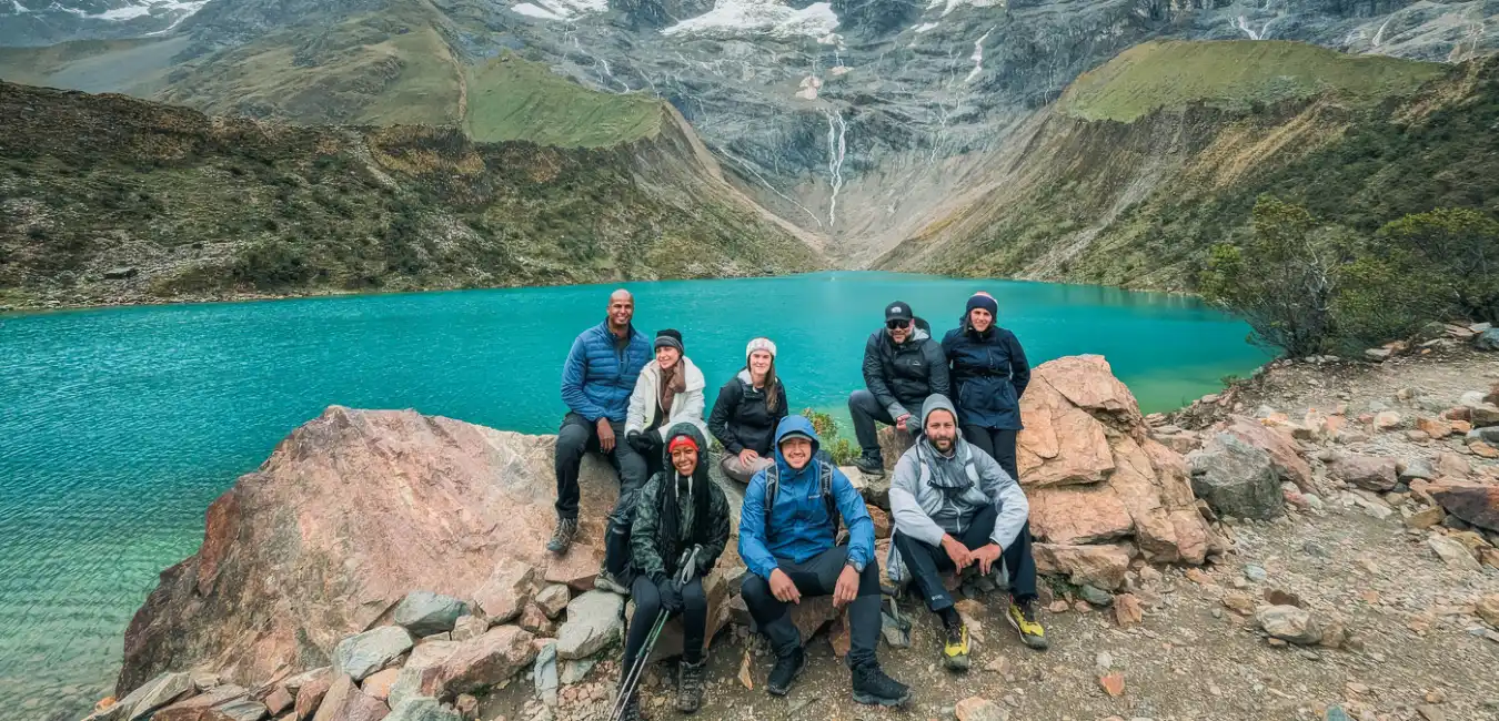 Tourists relaxing at Humantay Lake 