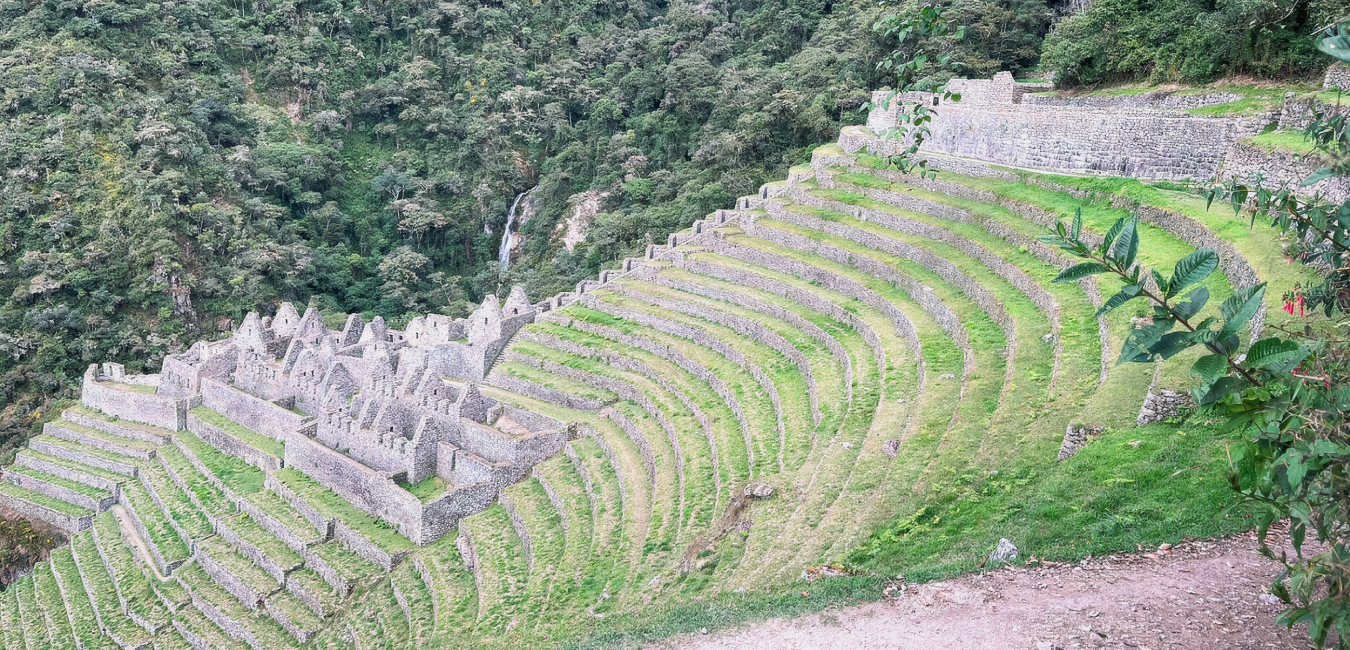 Terraced ruins of Wiñay Wayna archaeological site on a steep hillside along the Inca Trail to Machu Picchu