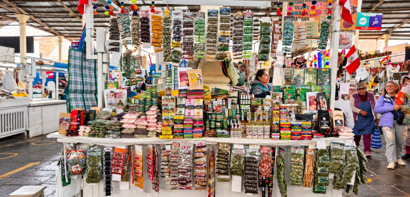 They are selling sweets at the San Pedro Market in Cusco.